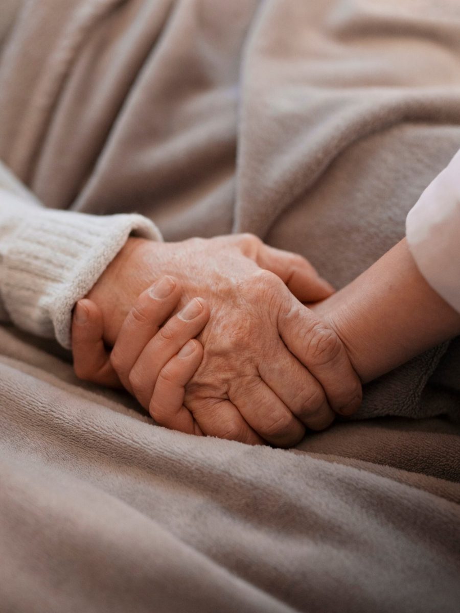 person-holding-elderly-woman-hand (1)